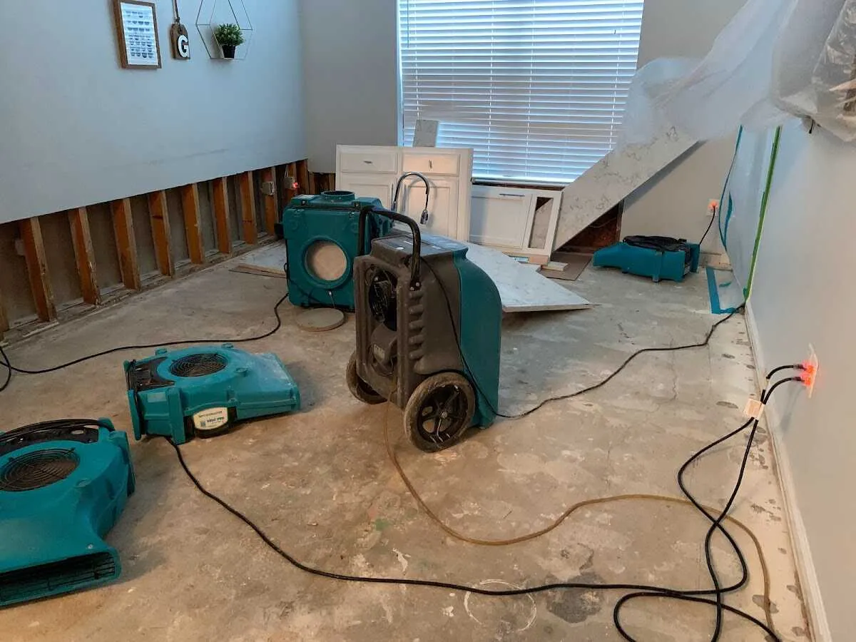 Dehumidifier in flood-cut room for Water Damage Restoration in Taunton